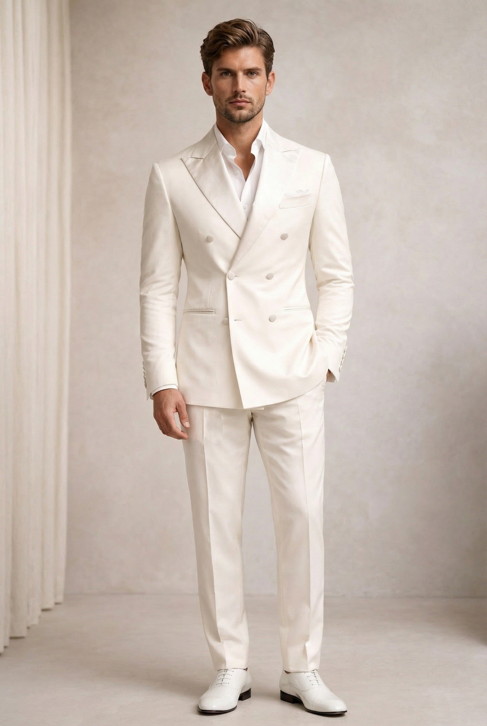 Man wearing a white tuxedo - Bown of London