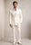Man wearing a white tuxedo - Bown of London